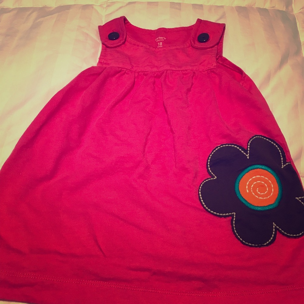 Pink jumper with big flower on it
